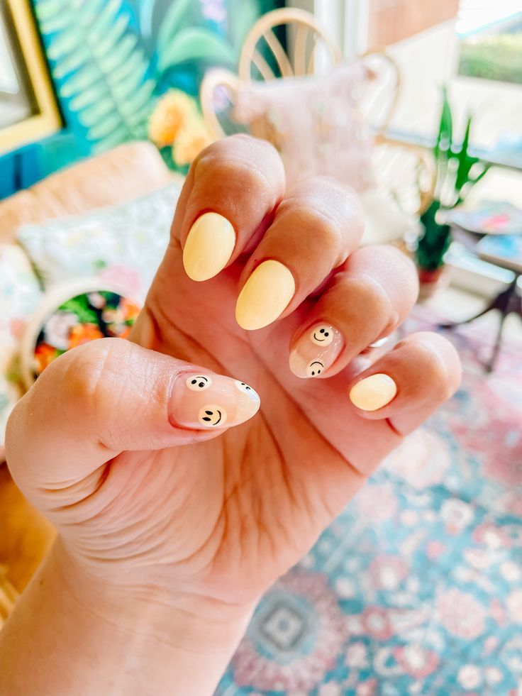 Happy spring nails, smiling hand close-up